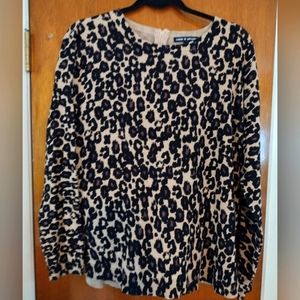 Cable and gauge sweater with little zip back